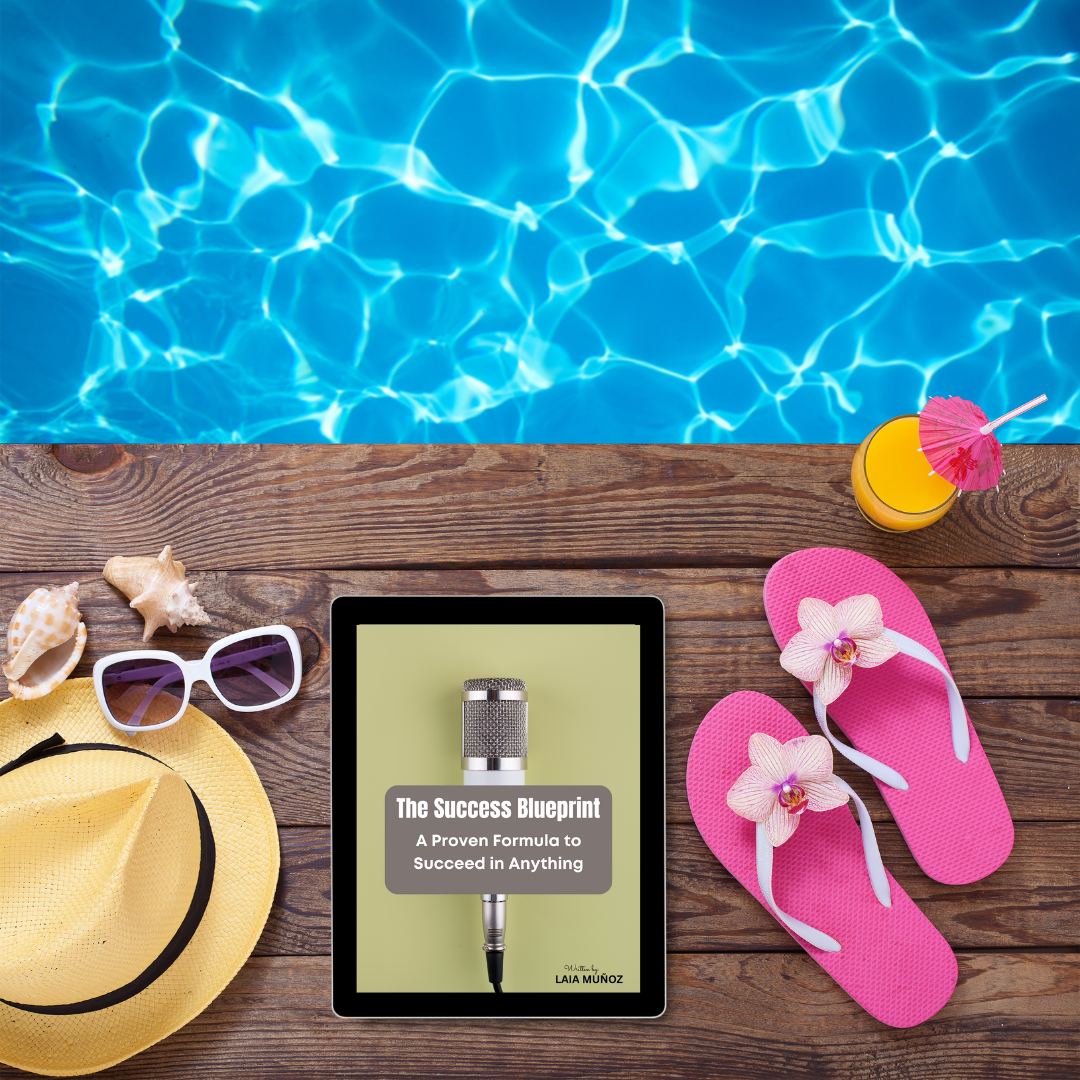 a tablet in a pool featuring a digital guide titled " The success blueprint. a proven formula to succeed in anything "