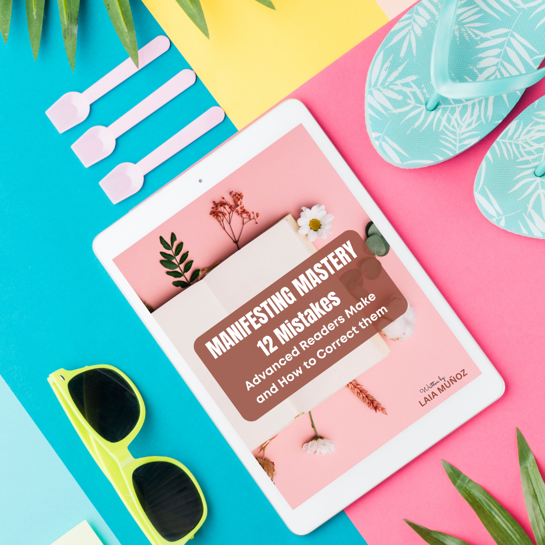 a tablet and sunglasses featuring an ebook called " mistakes advanced law of attraction readers make "