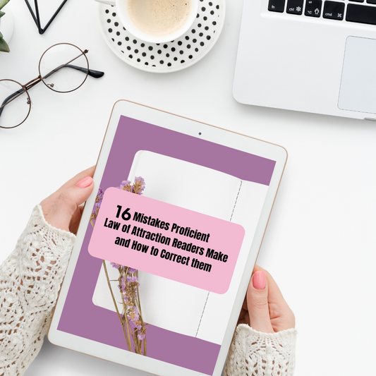 Person holding a tablet with a purple and pink design on a white desk with glasses, coffee, and laptop that features the digital guide called " 16 mistakes proficient law of attraction readers make and how to correct them " and you can buy it at www.laiamunozauthor.com