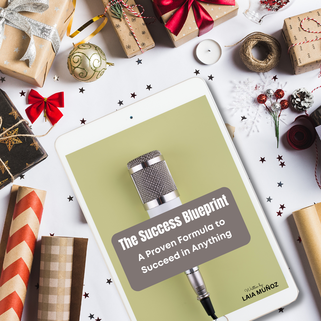 a tablet with gifts complements around it featuring a digital book called " the success blueprint"