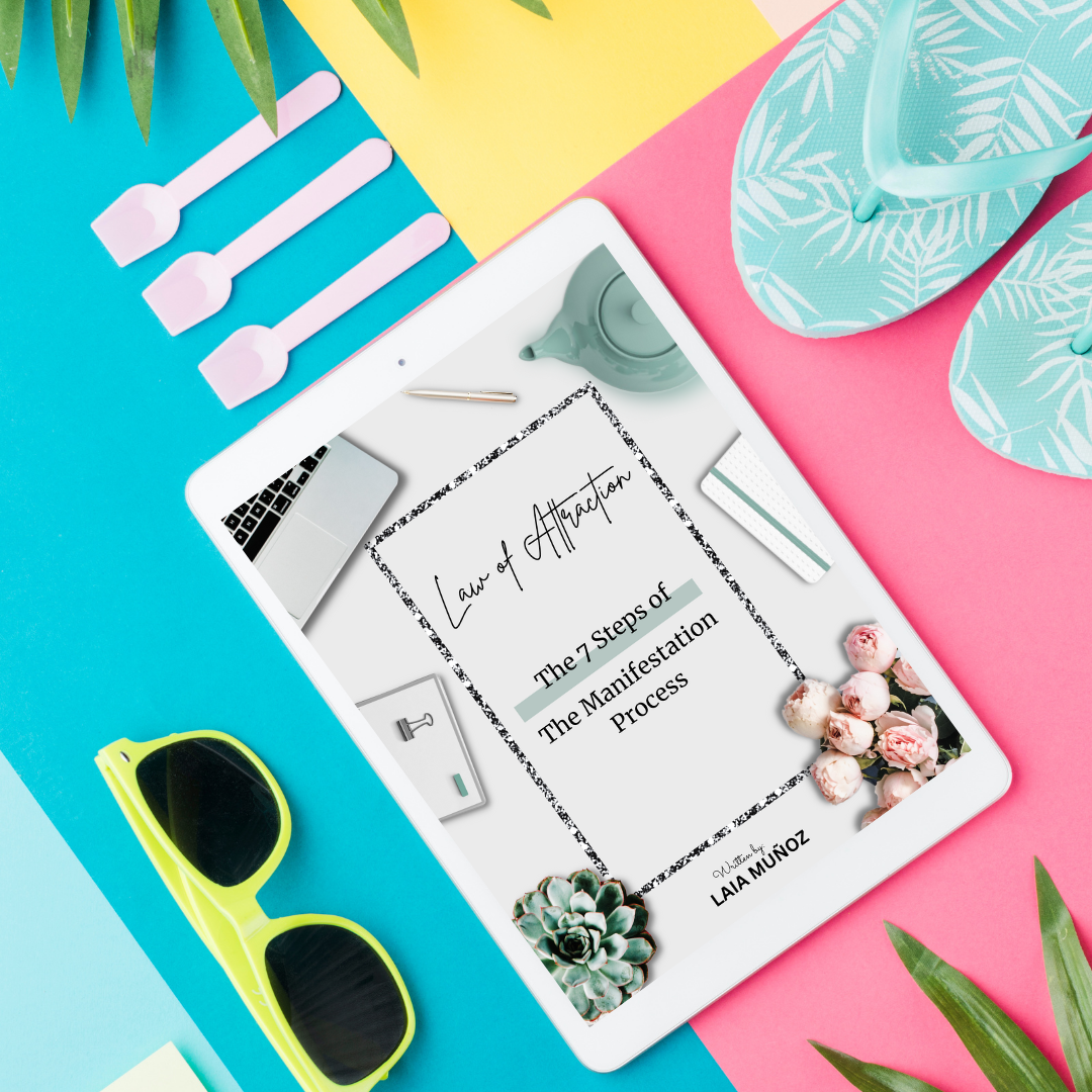sunglasses and a tablet mockup featuring the book Manifestation process